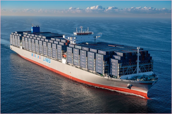 Container vessel navigating open seas